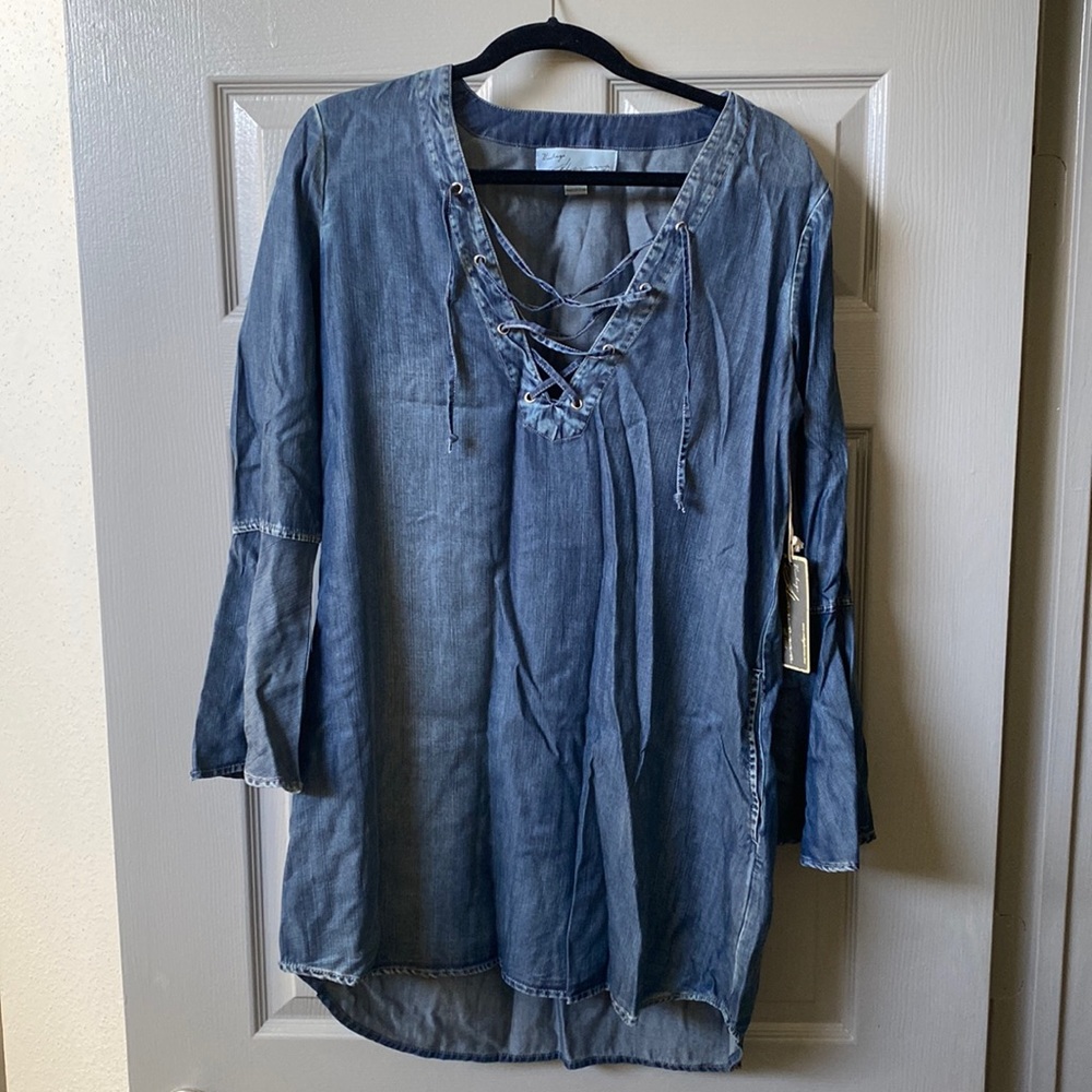 Adorable soft “jean” dress with pockets and bell sleeves. Never worn.